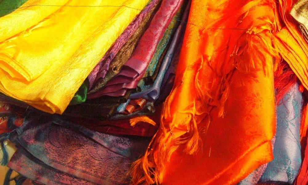 how to style a square silk scarf for different occasions